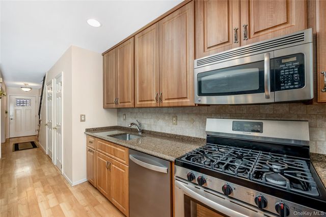 8 Town House Drive, Massapequa Park, NY 11762