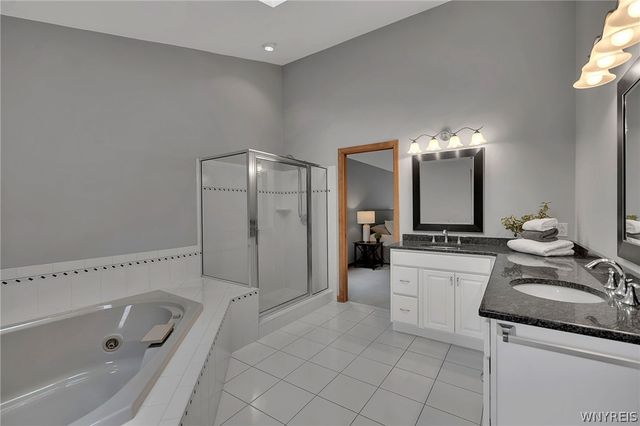 9530 Cobblestone Dr, Clarence, NY 14031