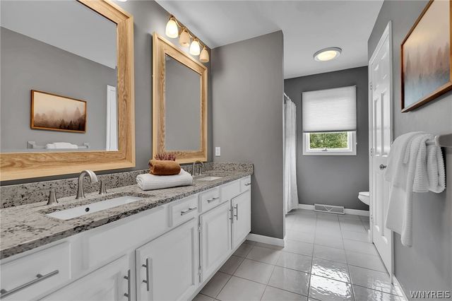 9530 Cobblestone Dr, Clarence, NY 14031