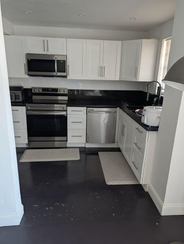 137 Golden Isles Drive, Hallandale Beach, FL 33009