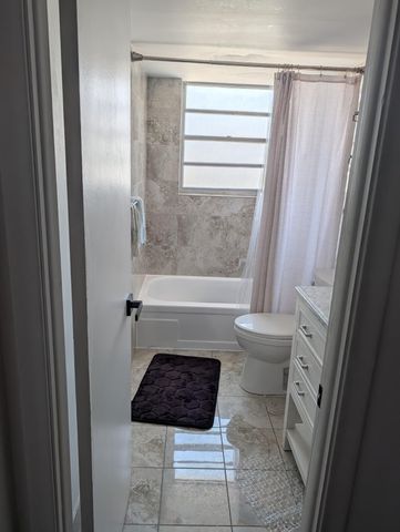 137 Golden Isles Drive, Hallandale Beach, FL 33009