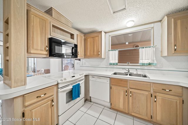 720 Periwinkle Circle, Barefoot Bay, FL 32976