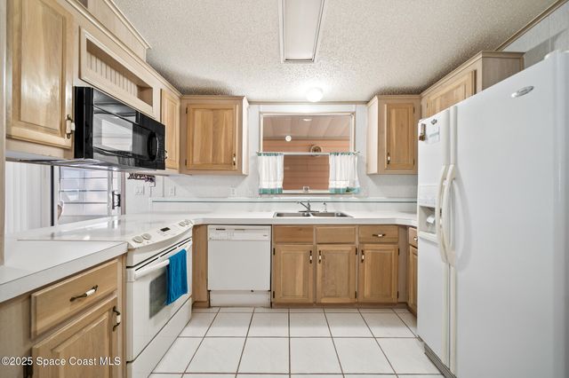 720 Periwinkle Circle, Barefoot Bay, FL 32976