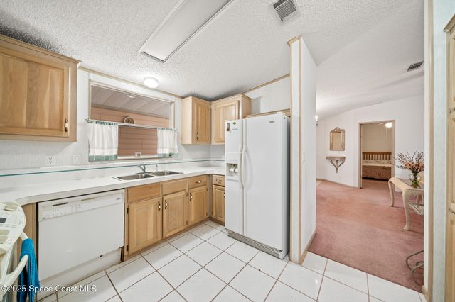 720 Periwinkle Circle, Barefoot Bay, FL 32976