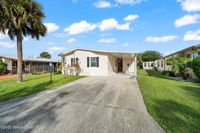 720 Periwinkle Circle, Barefoot Bay, FL 32976