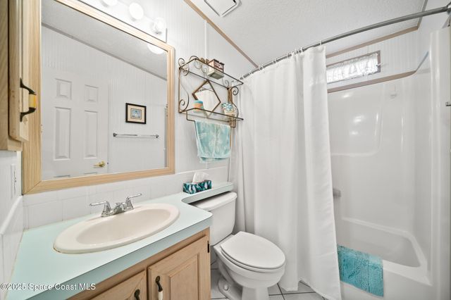 720 Periwinkle Circle, Barefoot Bay, FL 32976