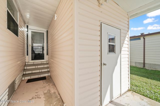 720 Periwinkle Circle, Barefoot Bay, FL 32976