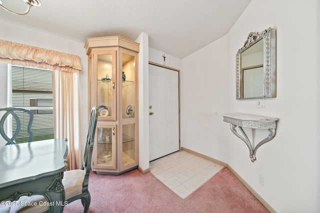 720 Periwinkle Circle, Barefoot Bay, FL 32976