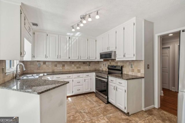 1210 Swan Mill Court, Suwanee, GA 30024