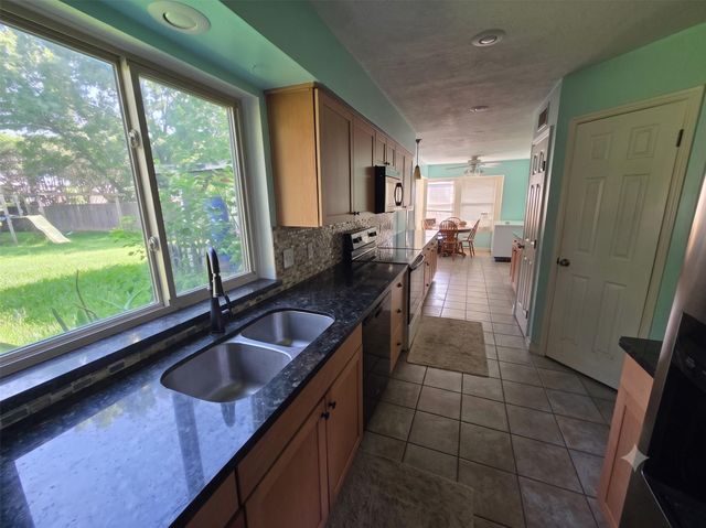 15355 Meadow Village Drive, Houston, TX 77095