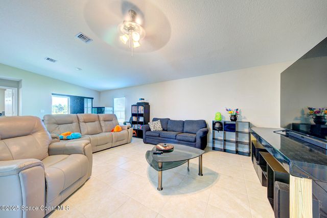 318 Silver Frost Street SE, Palm Bay, FL 32909