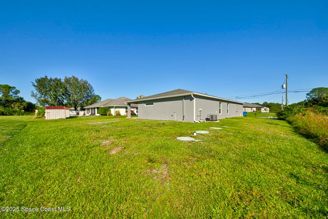318 Silver Frost Street SE, Palm Bay, FL 32909