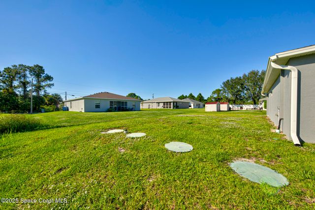 318 Silver Frost Street SE, Palm Bay, FL 32909