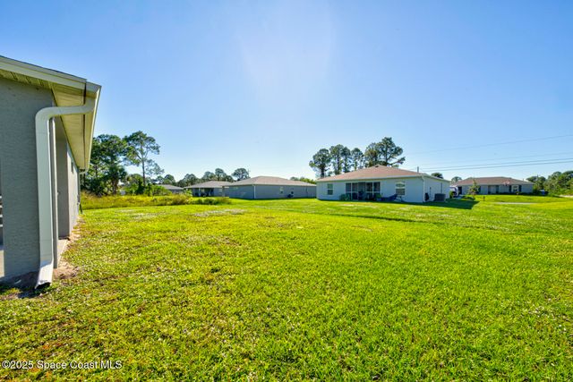 318 Silver Frost Street SE, Palm Bay, FL 32909