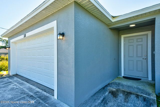 318 Silver Frost Street SE, Palm Bay, FL 32909