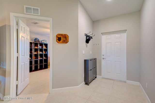 318 Silver Frost Street SE, Palm Bay, FL 32909