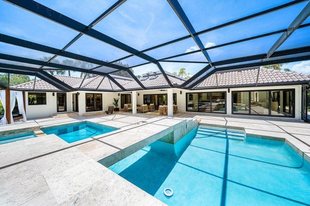 1648 Breakers West Boulevard, West Palm Beach, FL 33411