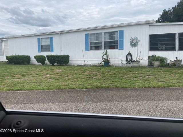 1056 Wood Court NE, Palm Bay, FL 32907