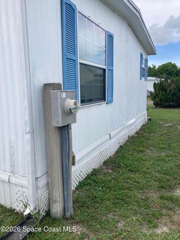1056 Wood Court NE, Palm Bay, FL 32907