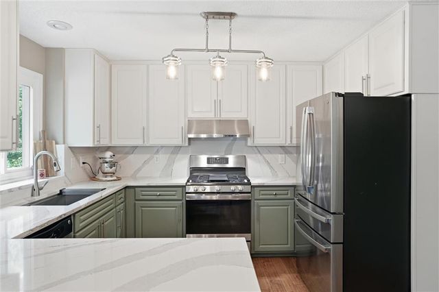 204 N WALKER Drive, Raymore, MO 64083