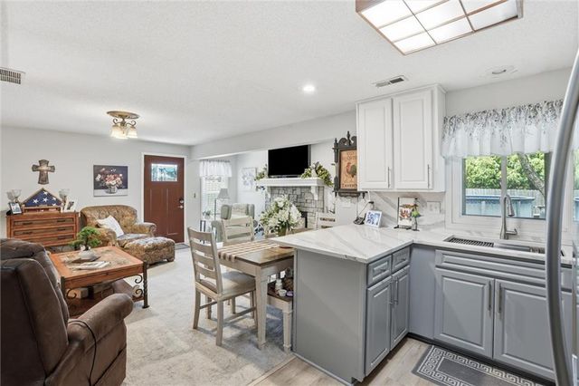 204 N WALKER Drive, Raymore, MO 64083