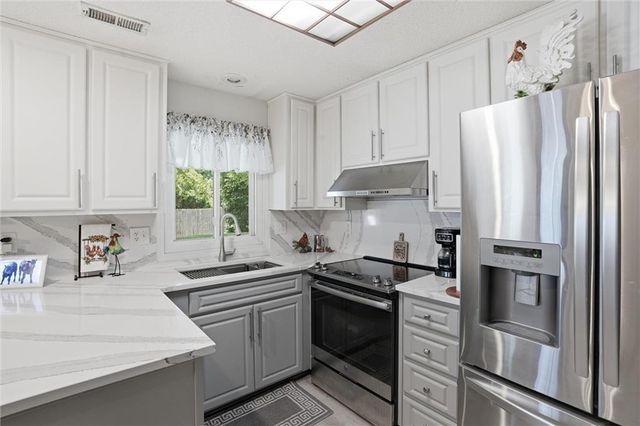 204 N WALKER Drive, Raymore, MO 64083