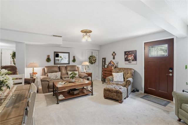 204 N WALKER Drive, Raymore, MO 64083