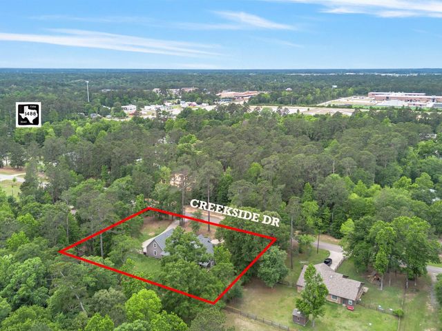 210 Creekside Drive, Magnolia, TX 77354
