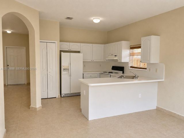 705 SE 13th Ter ., Homestead, FL 33033