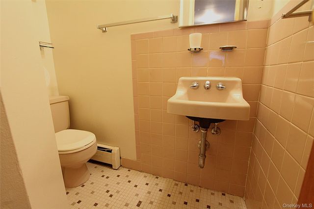 58-18 84th Place, Middle Village, NY 11379