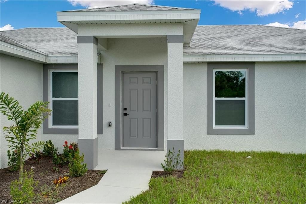 3010 67th ST W, LEHIGH ACRES, FL 33971 — exterior