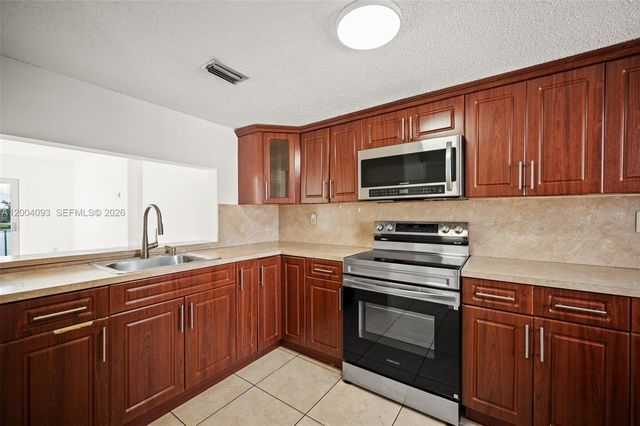 9915 W Okeechobee Rd 2-403, Hialeah Gardens, FL 33016