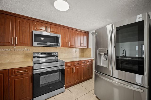 9915 W Okeechobee Rd 2-403, Hialeah Gardens, FL 33016