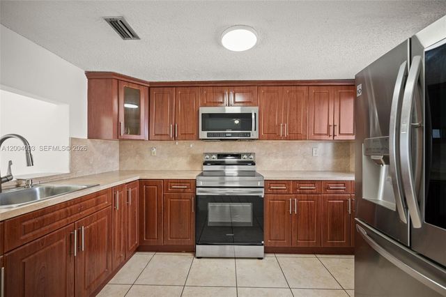 9915 W Okeechobee Rd 2-403, Hialeah Gardens, FL 33016