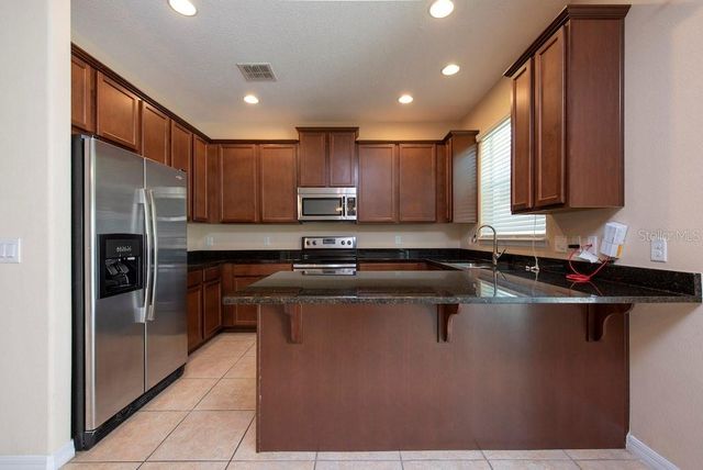 9460 TAWNYBERRY STREET, Orlando, FL 32832