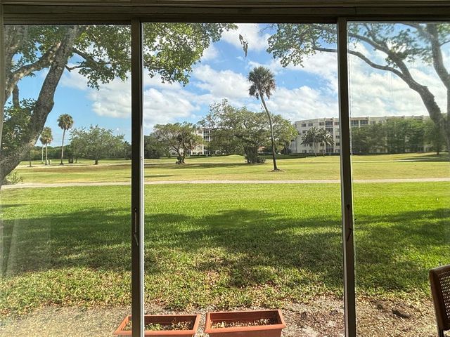 3700 Oaks Clubhouse Drive 103, Pompano Beach, FL 33069
