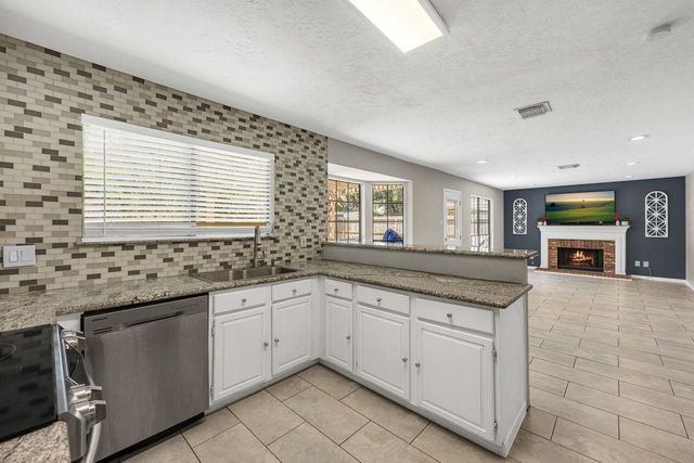 8419 Sunny Ridge Drive, Houston, TX 77095