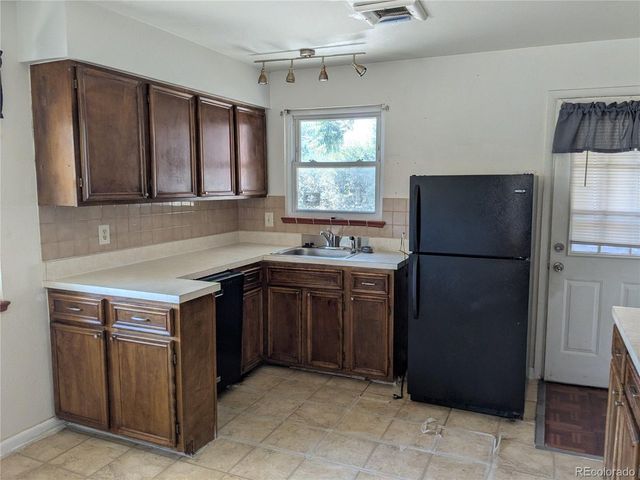 1676 S Wolcott Ct, Denver, CO 80219