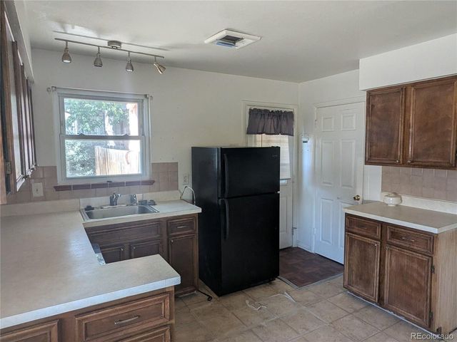 1676 S Wolcott Ct, Denver, CO 80219