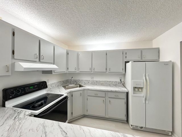 102 Lake Pine Circle D-1, Greenacres, FL 33463