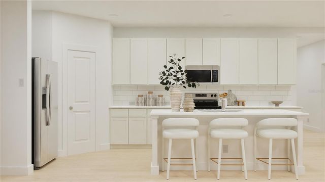 909 TUNDRA LOOP, Groveland, FL 34736