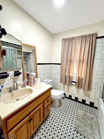 93 Piaget Ave, Clifton City, NJ 07011
