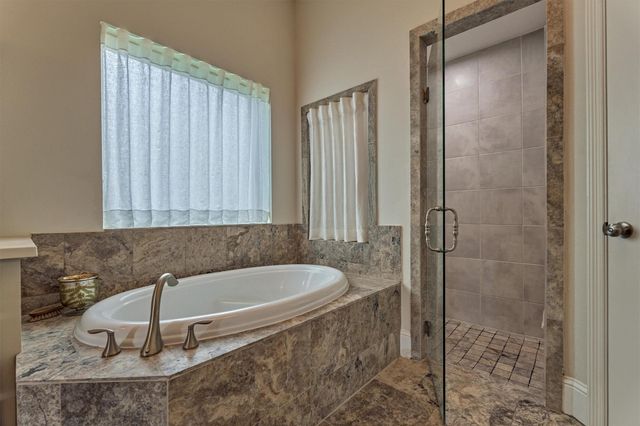 30 W Twin Ponds Court, Tomball, TX 77375