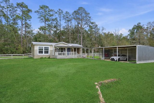 395 County Road 3891 S, Cleveland, TX 77328