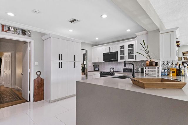 5702 Melaleuca Drive, Tamarac, FL 33319