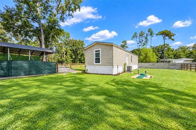 225 County Road 3294, Cleveland, TX 77327