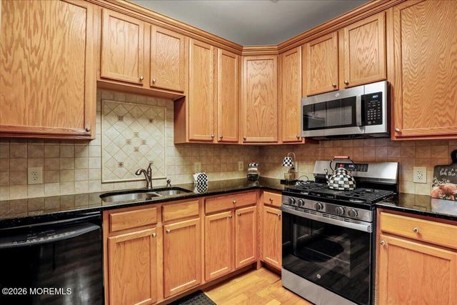 203 Canterbury Lane, Morganville, NJ 07751