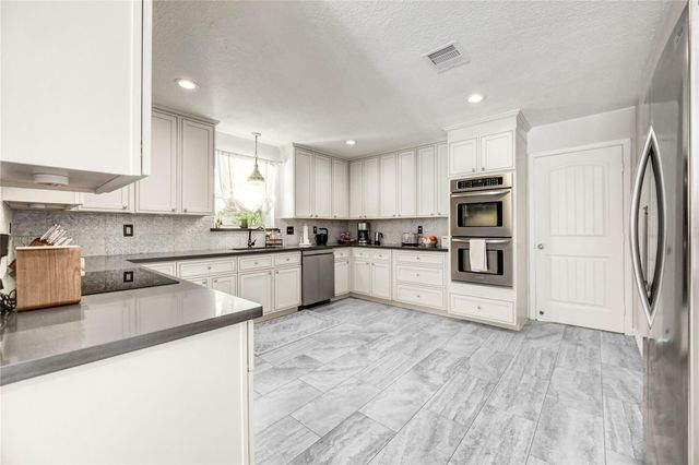 11715 Cypresswood Drive, Houston, TX 77070