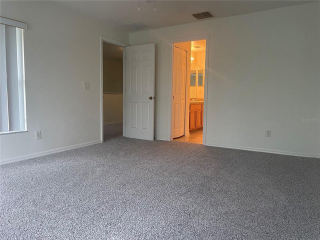 9906 TIVOLI VILLA DRIVE, Orlando, FL 32829