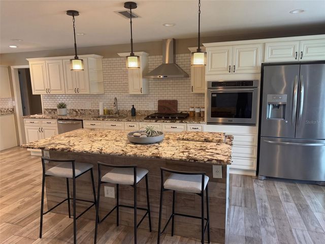 1410 SAXON BOULEVARD, Deltona, FL 32725